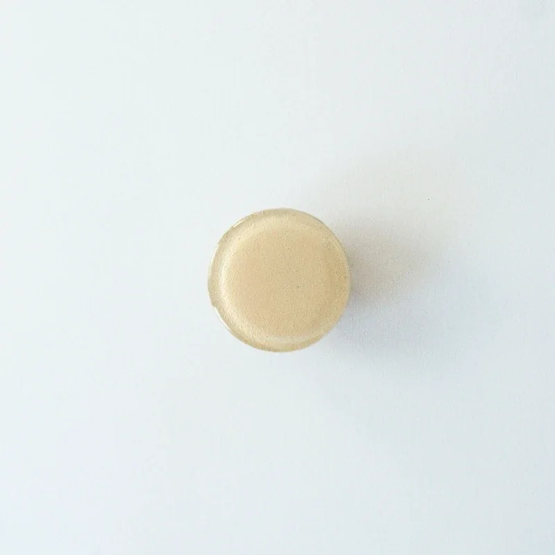 Möbelknopp, runt glas, rosa beige